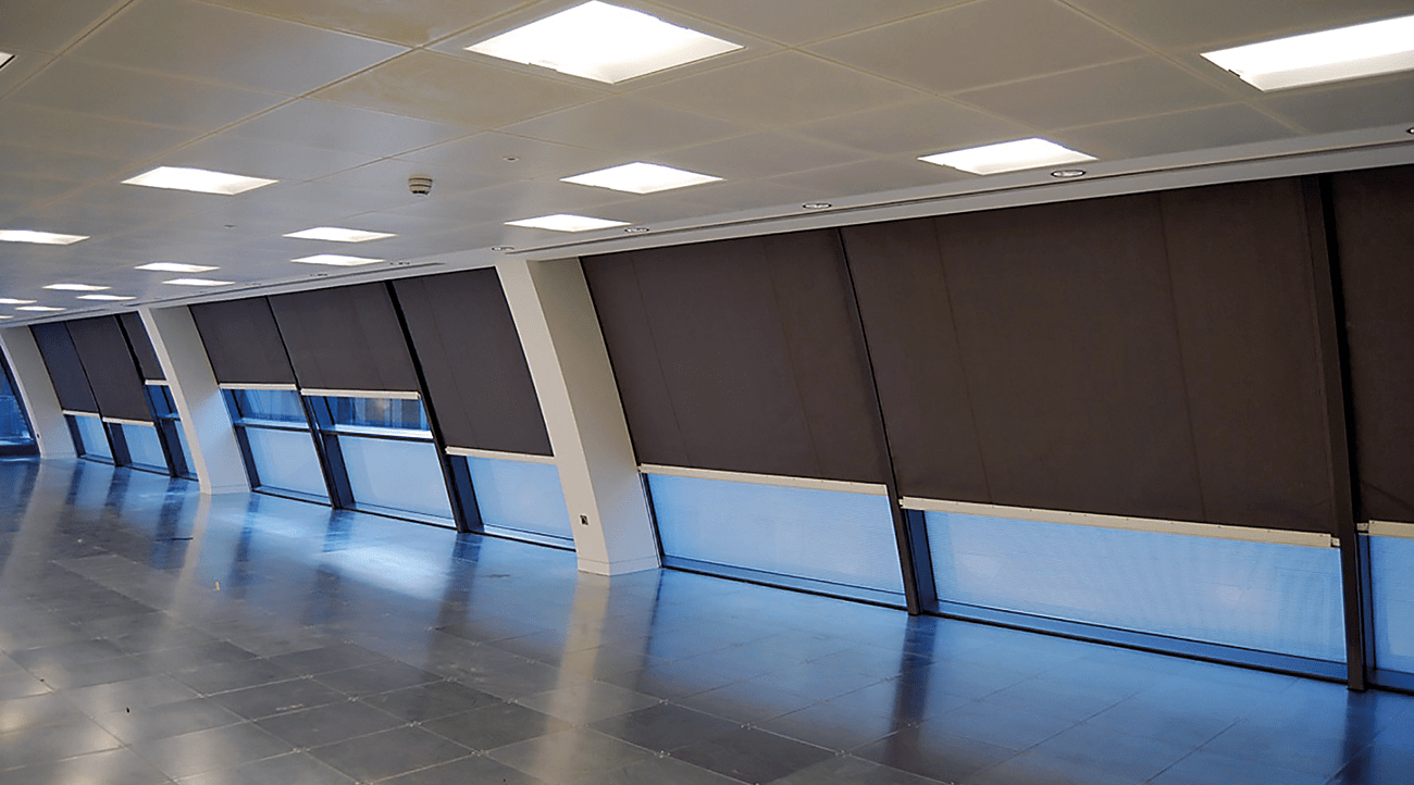Boundary protection fire curtains over windows at Dover Street, London.