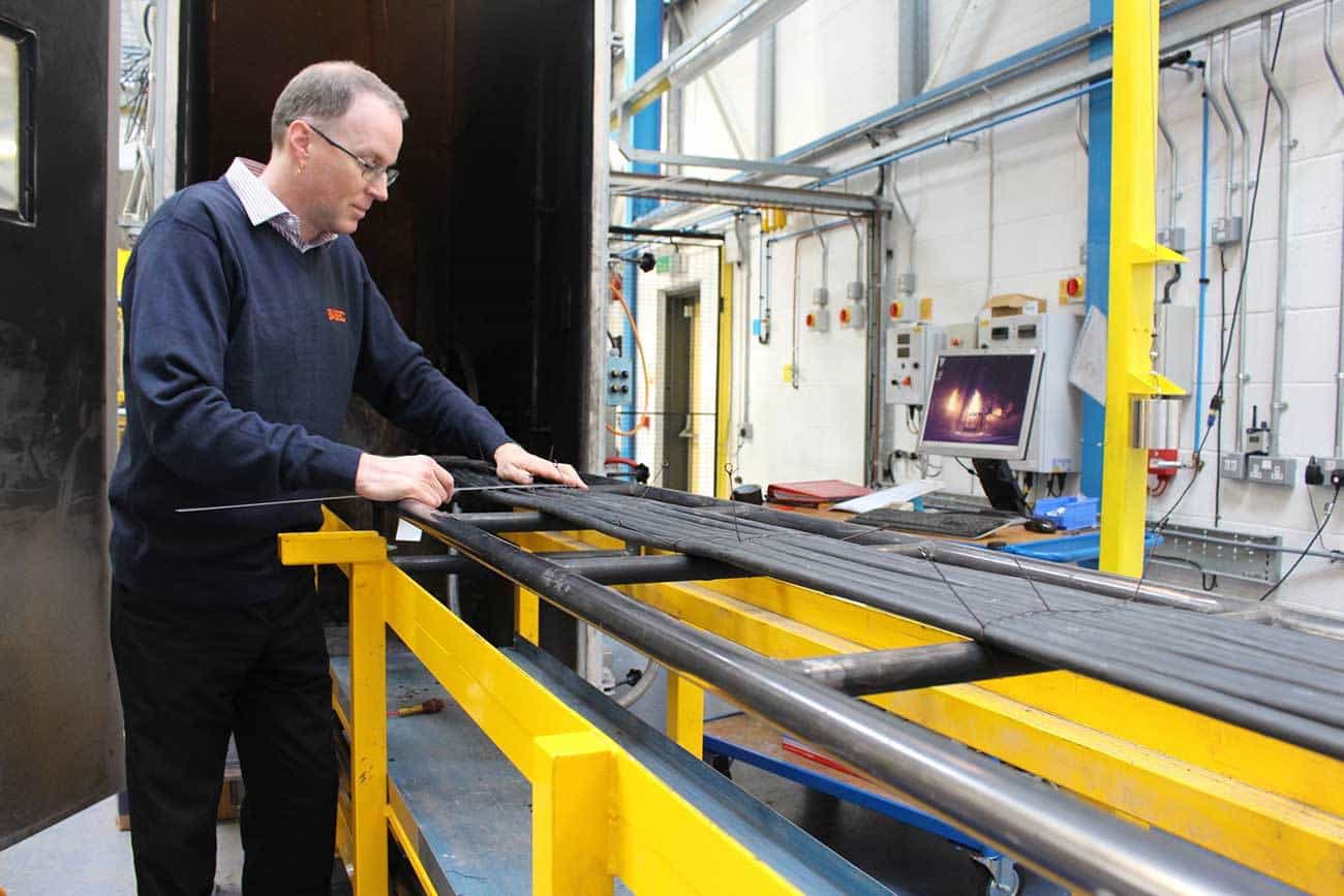 Dave Hoare, product manager at BASEC setting up the large-scale vertical ladder test used for CPR