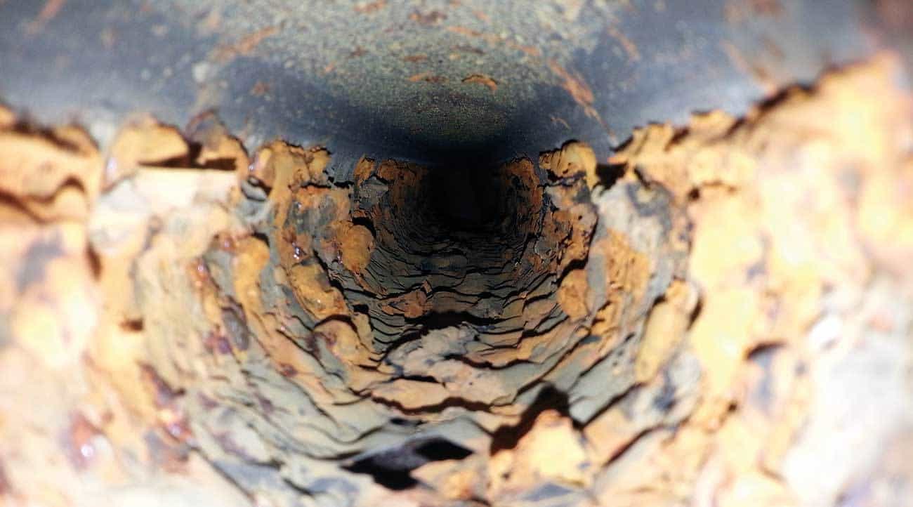 Severe corrosion in a steel pipe.