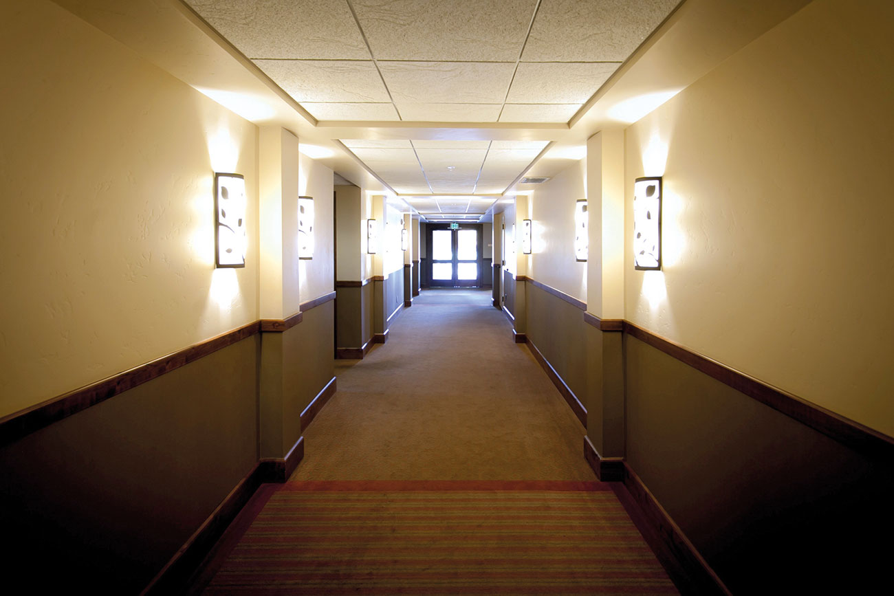 Smoke detection and control, emergency lighting, logistical support and signage are all important factors in managing hotel evacuation.