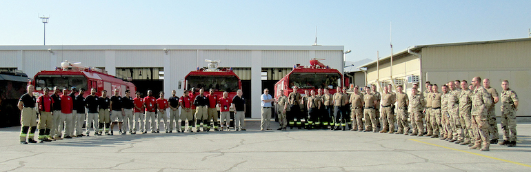 Outgoing G3 Systems Chief Fire Officer Derek Tomlinson hands over to DEU Fire Chief LT Sven Topfer and wishes the incumbent personnel a safe and successful mission to the end of DEU involvement on 5 July 2021. (G3 Systems)
