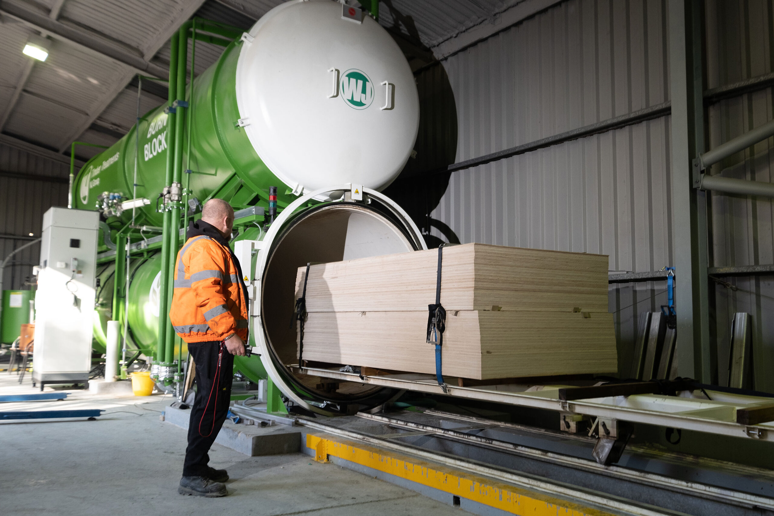 Loading the timber ready for Burnblock fire retardant treatment.